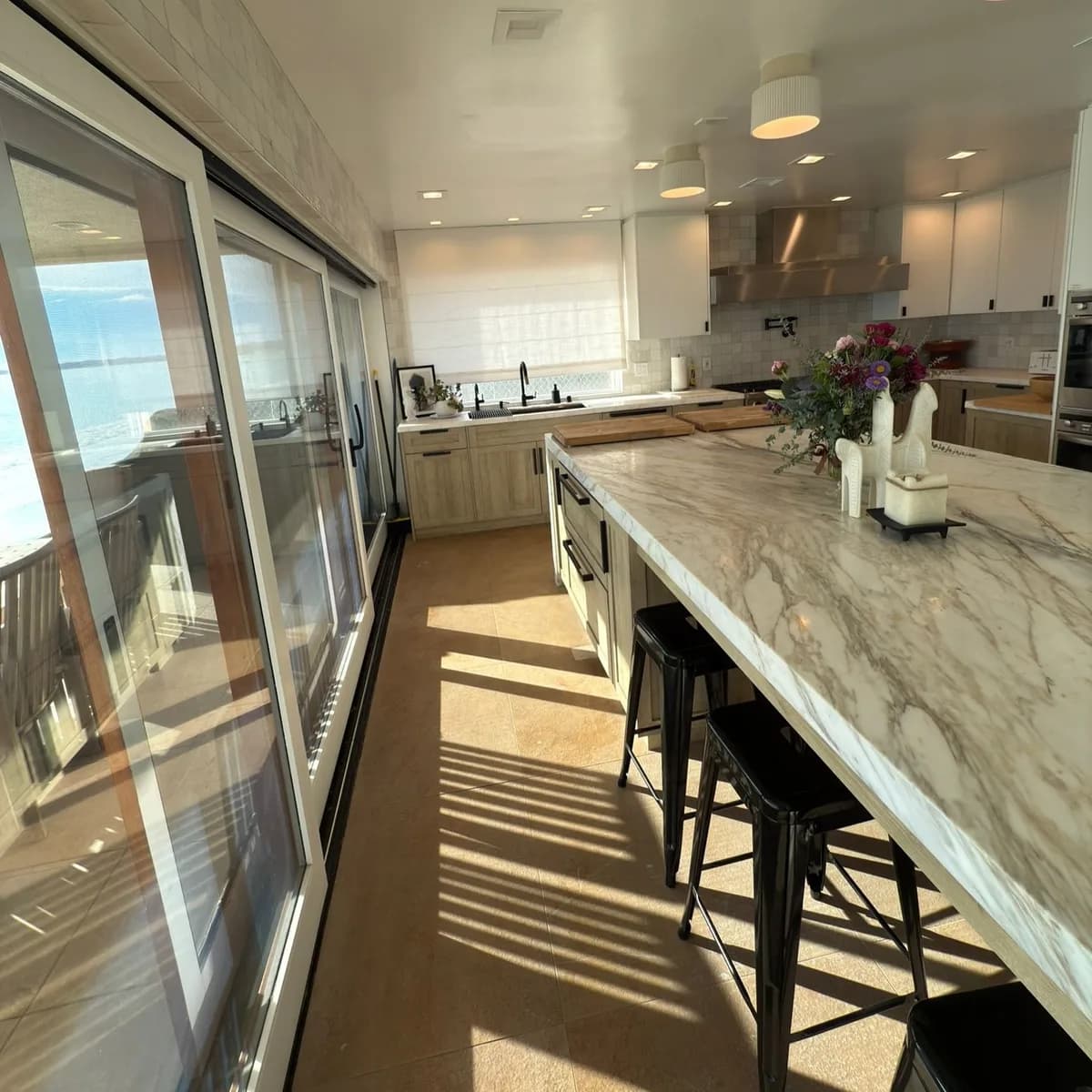 Bright marble kitchen cleaned and reset